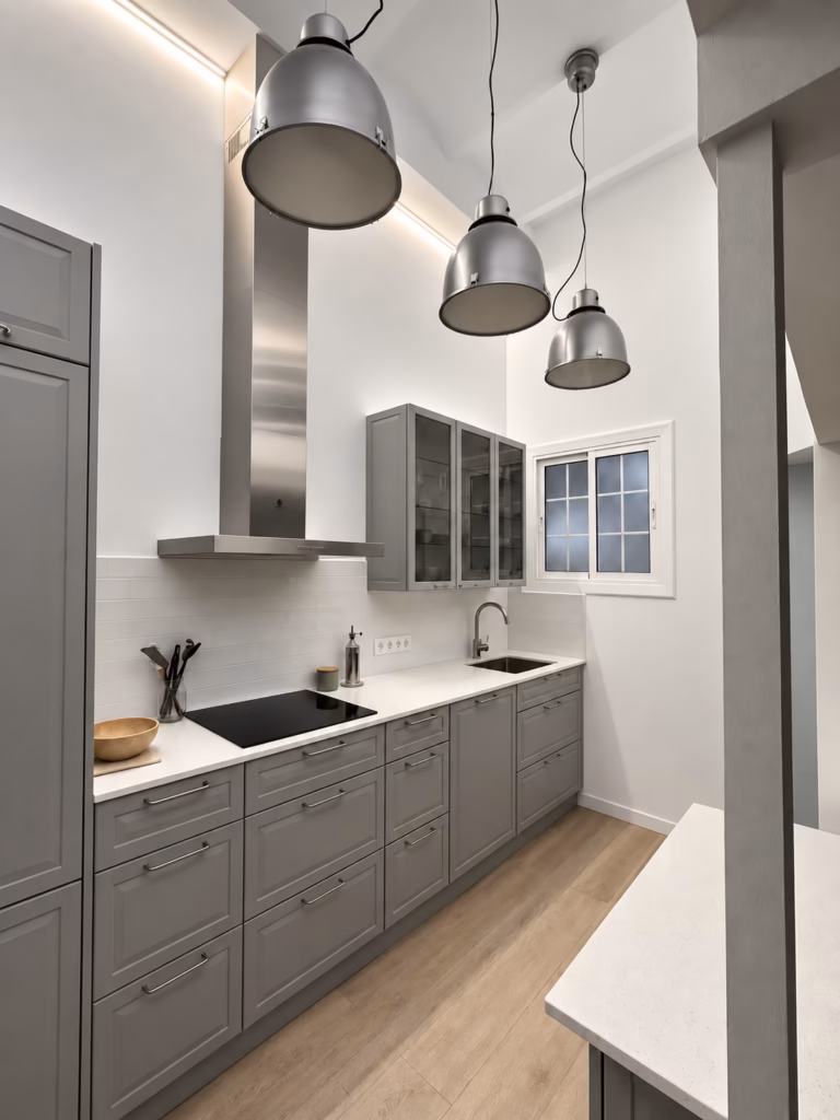 Cocina Kvik PAVIA reformada por Arkhe en una vivienda de Casa Calvet, Barcelona