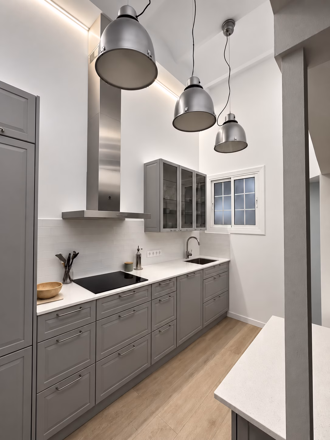 Cocina Kvik PAVIA reformada por Arkhe en una vivienda de Casa Calvet, Barcelona